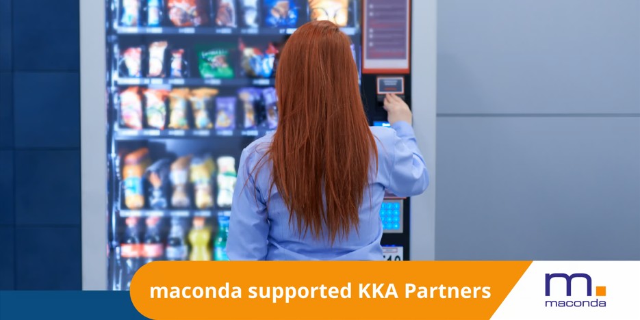 maconda supported KKA Partners – woman at a snack vending machine